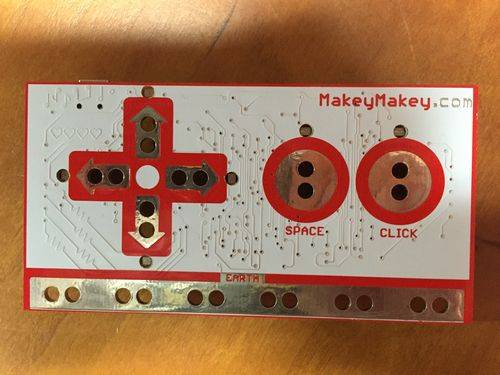 The front face of the Makey Makey board